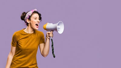 Woman-Shouting-Into-Megaphone-optimized